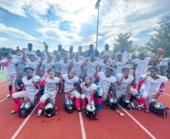 Liberty Group donated pink uniforms to the Brick City Lions in Newark NJ.